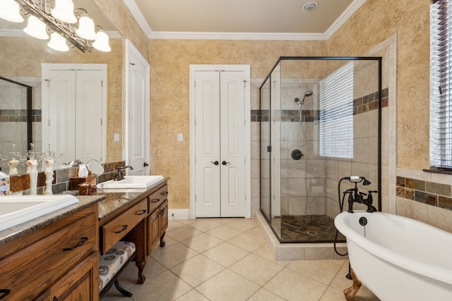 bathroom with vanity, ornamental molding, and separate shower and tub