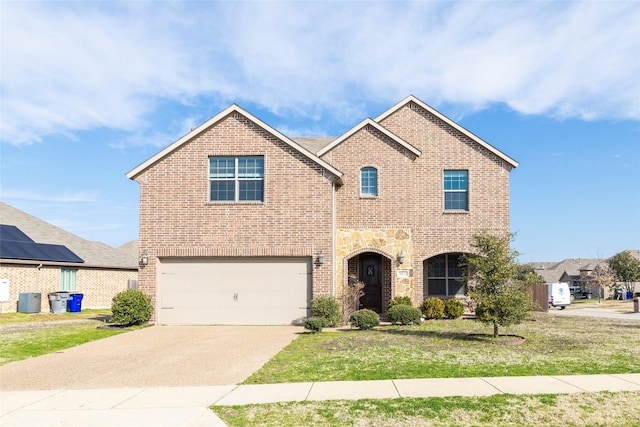 view of front of property with central AC unit, a garage, and a front yard