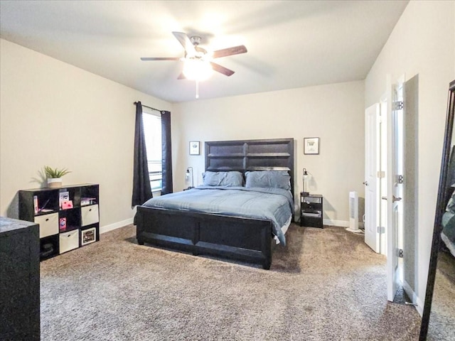 bedroom featuring carpet, a ceiling fan, and baseboards