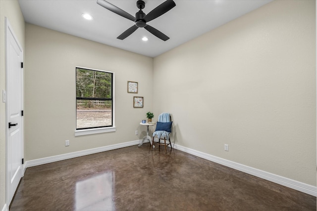 unfurnished room with ceiling fan, finished concrete floors, baseboards, and recessed lighting