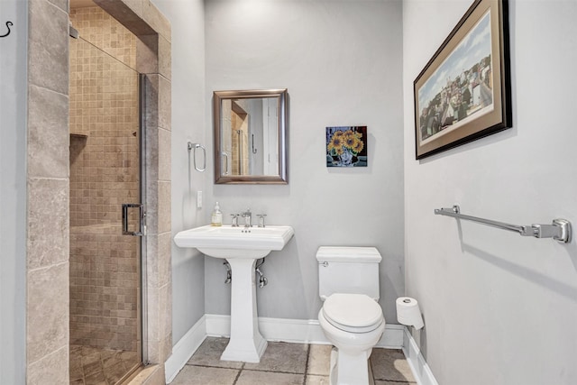 bathroom with walk in shower and toilet