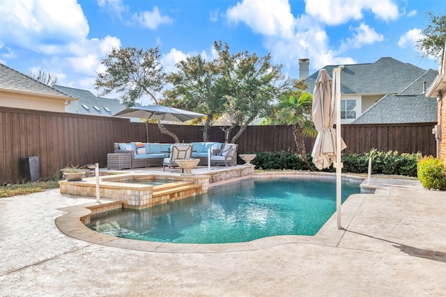 view of pool featuring an in ground hot tub, an outdoor hangout area, and a patio area