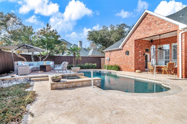 view of swimming pool featuring an in ground hot tub, outdoor lounge area, and a patio