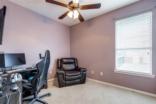 office space featuring carpet floors and ceiling fan