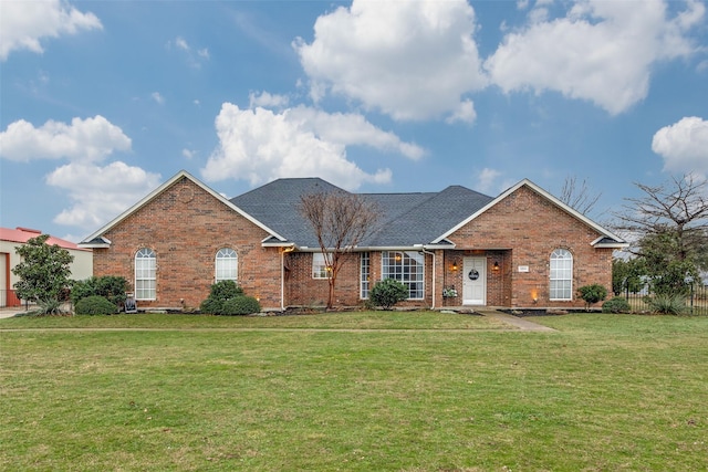 view of front of property with a front lawn