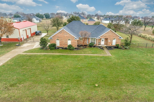 view of front of home featuring a garage and a front lawn