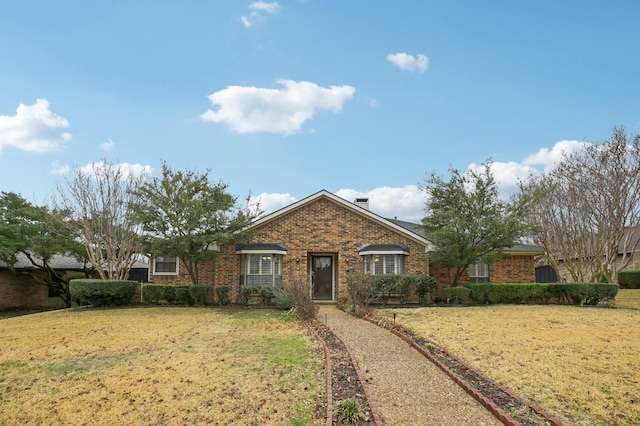 ranch-style house with a front yard