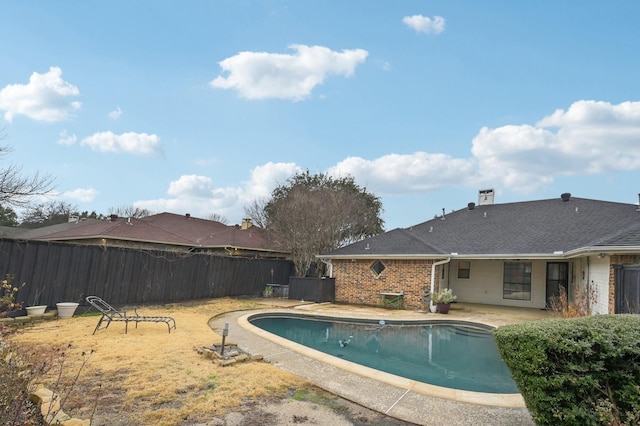 view of swimming pool featuring a patio