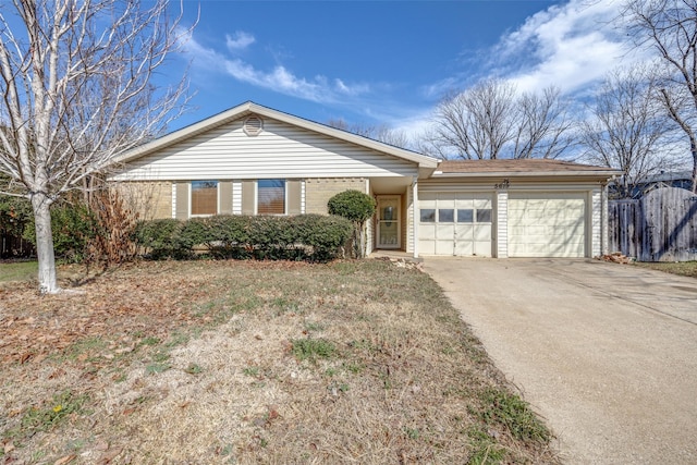 single story home featuring a garage