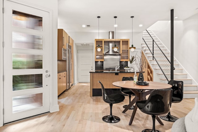 interior space with sink and light hardwood / wood-style floors