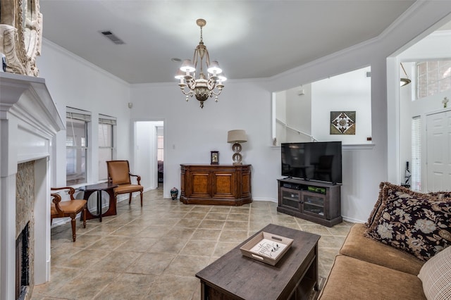 living room with ornamental molding and an inviting chandelier