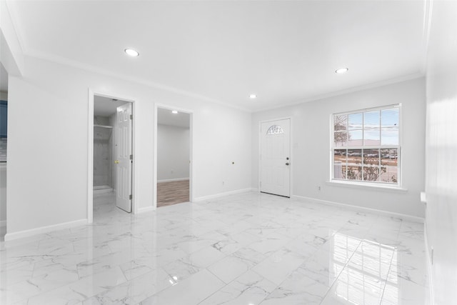 unfurnished room with recessed lighting, baseboards, marble finish floor, and ornamental molding