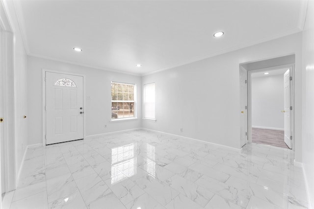 foyer entrance featuring crown molding, recessed lighting, baseboards, and marble finish floor