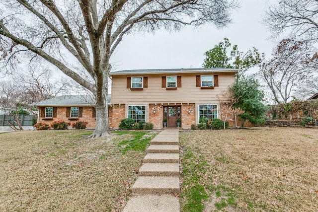 view of front facade with a front lawn