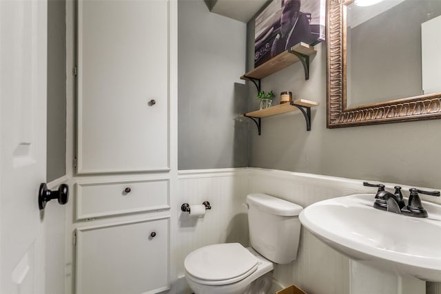 bathroom with sink and toilet