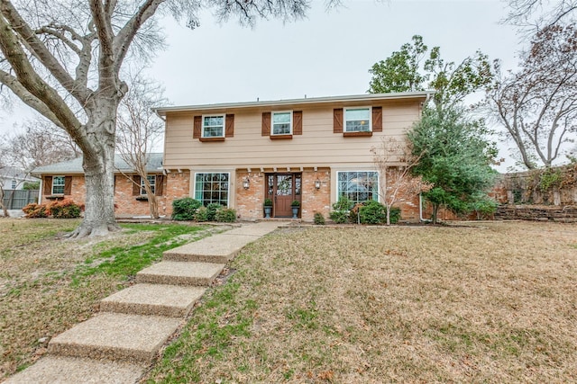 view of front of property with a front lawn