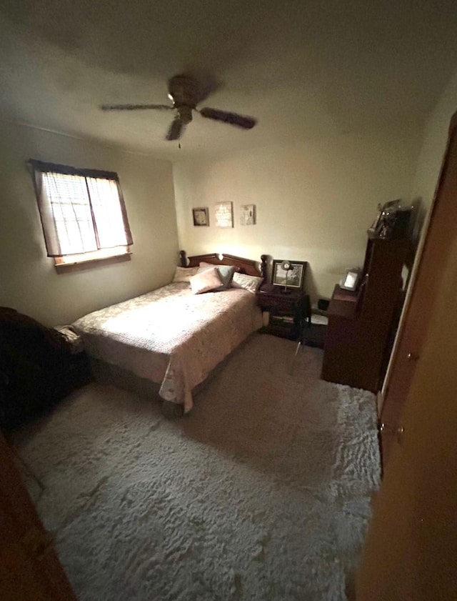 bedroom with carpet floors and ceiling fan