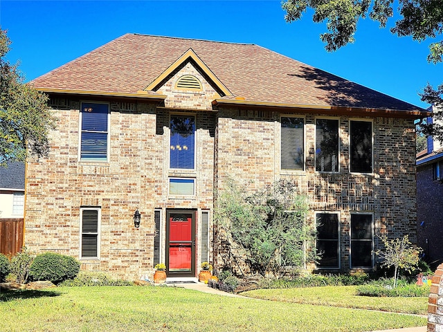 view of front facade with a front lawn