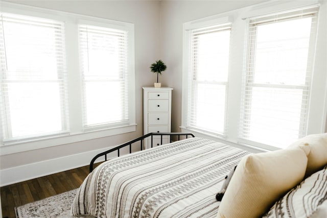 bedroom featuring hardwood / wood-style flooring