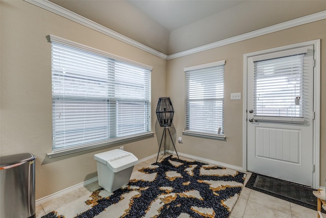 doorway to outside with light tile patterned floors