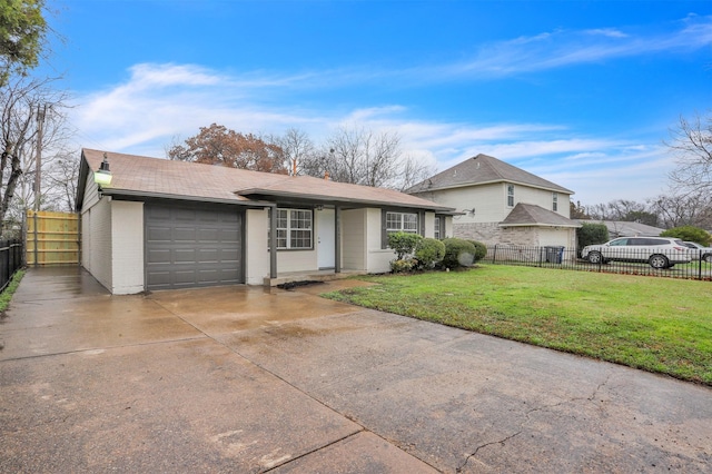 single story home with a garage and a front yard