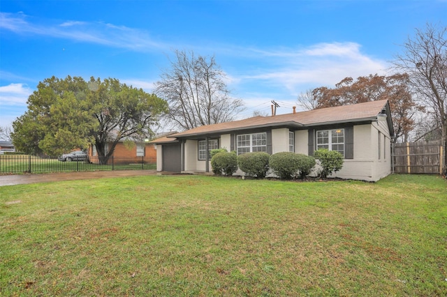 ranch-style home with a front lawn