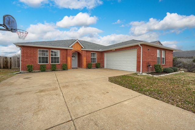 ranch-style house with a garage and a front lawn