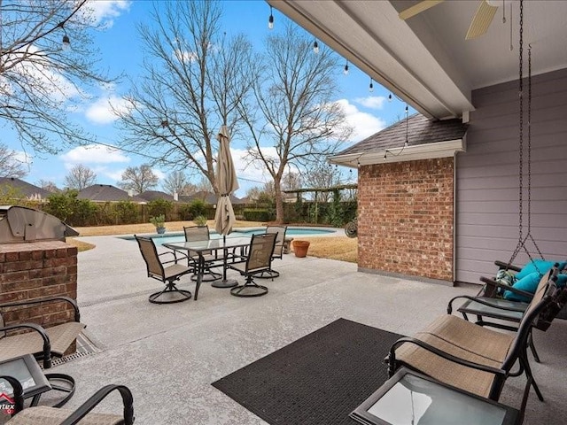 view of patio / terrace featuring a fenced in pool