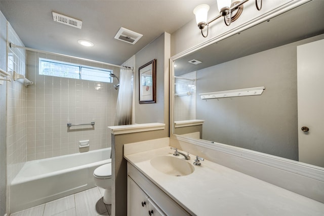 full bathroom featuring vanity, toilet, and shower / bath combo