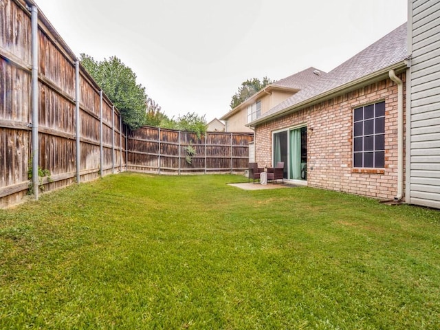 view of yard with a patio area