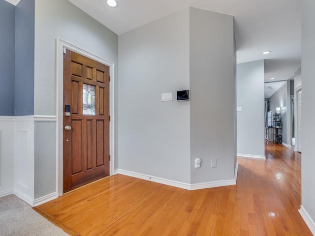 entrance foyer with hardwood / wood-style floors