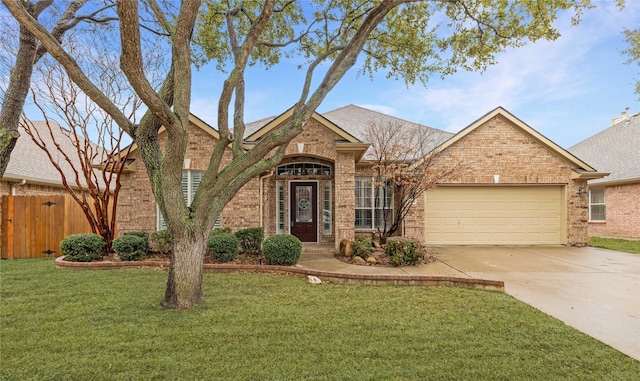 view of front facade featuring a garage and a front lawn