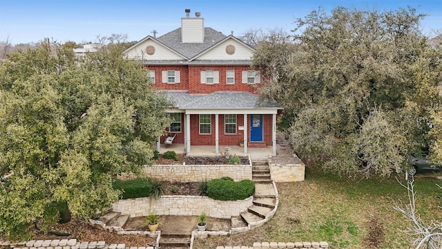 view of front of property with a patio