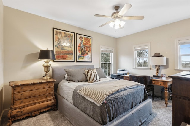 carpeted bedroom featuring ceiling fan