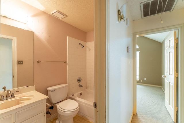 full bathroom with visible vents, toilet,  shower combination, a textured ceiling, and vanity