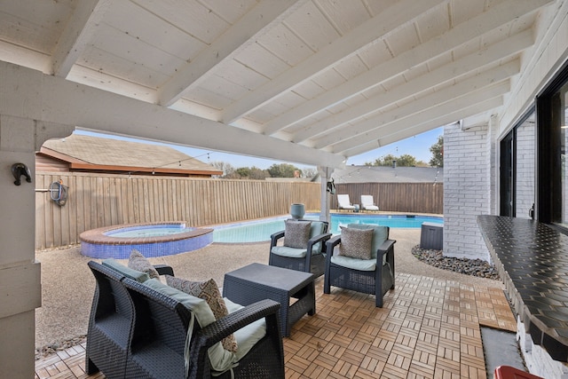 view of patio with a pool with hot tub