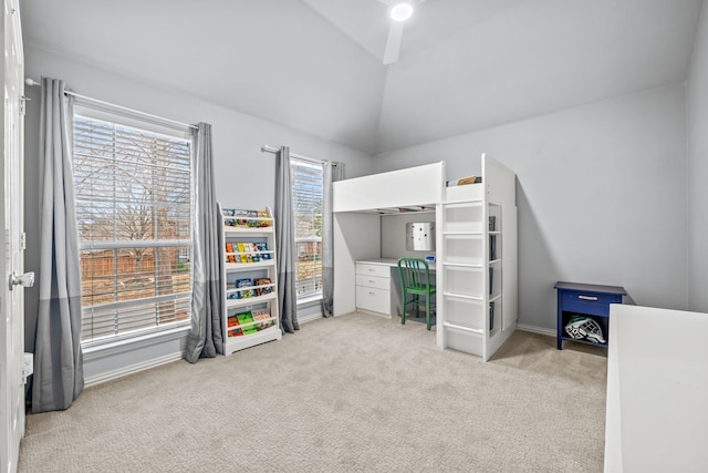 bedroom featuring vaulted ceiling and carpet flooring