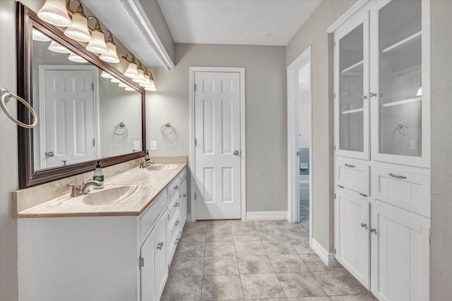 bathroom featuring vanity and tile patterned floors