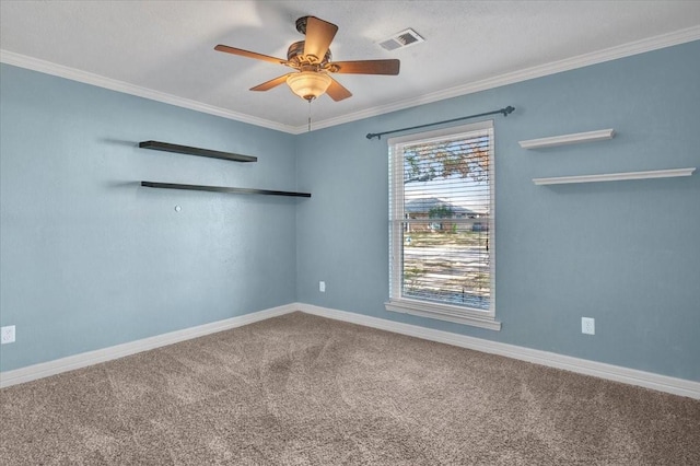 unfurnished room with ornamental molding, ceiling fan, and carpet flooring