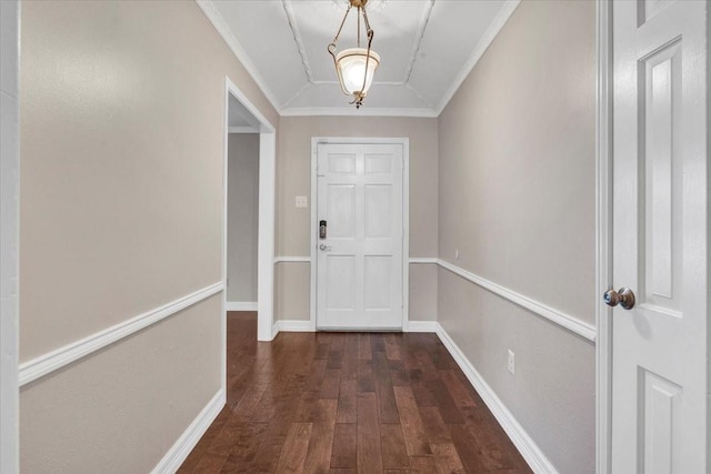 doorway to outside with ornamental molding and dark hardwood / wood-style floors