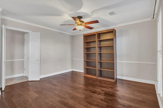 interior space with crown molding, dark wood-type flooring, and ceiling fan