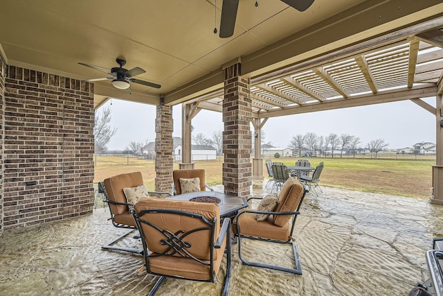 view of patio / terrace featuring ceiling fan