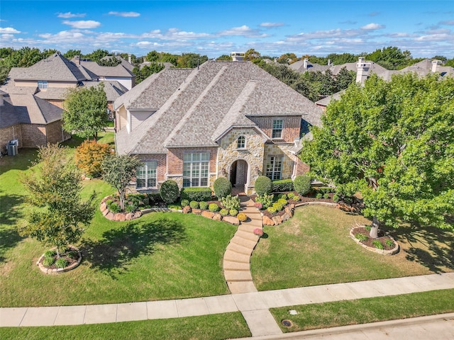 view of front of house with a front lawn