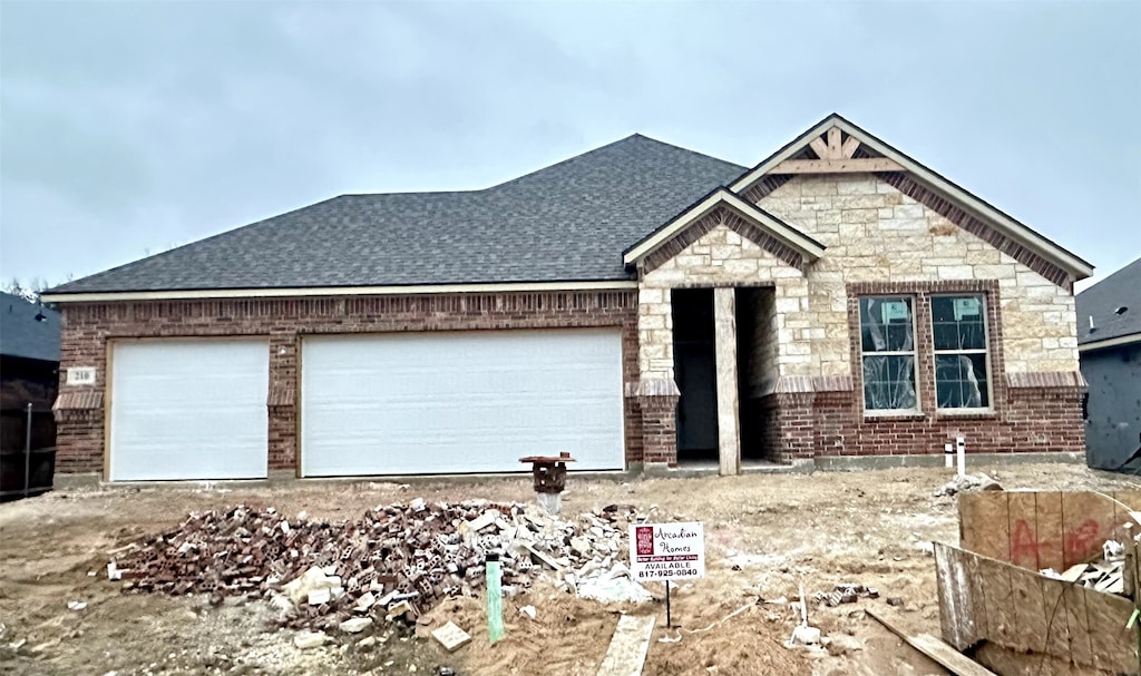 view of front of house with a garage