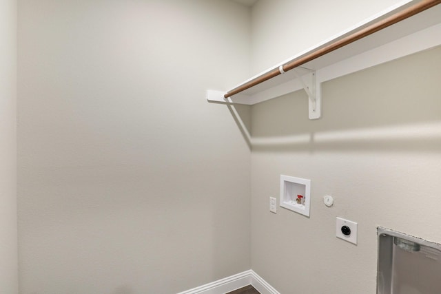 clothes washing area featuring laundry area, hookup for a washing machine, hookup for a gas dryer, baseboards, and hookup for an electric dryer