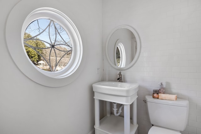 bathroom featuring toilet