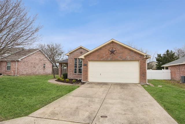 view of front of home featuring a garage and a front yard