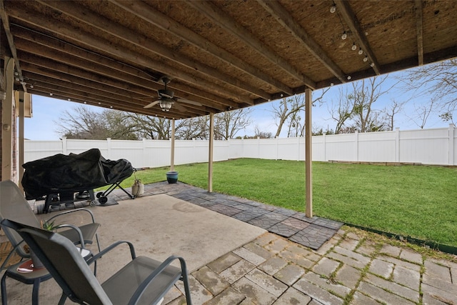 view of patio featuring ceiling fan and area for grilling