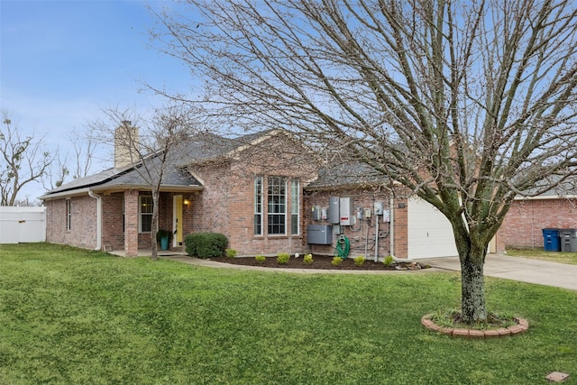 view of front of home with a garage and a front yard