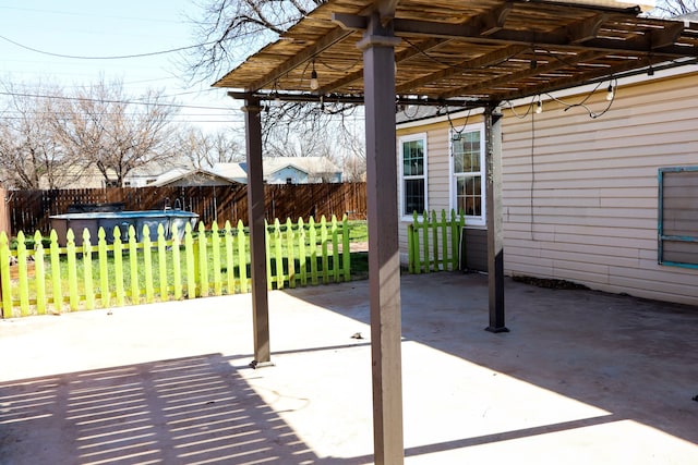 view of patio featuring a pergola